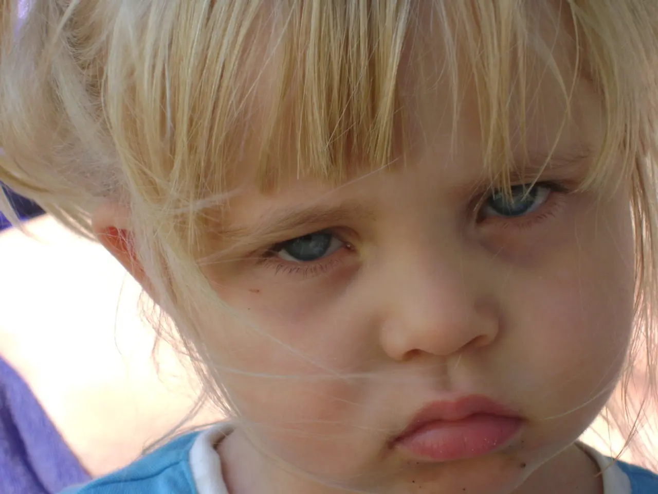 In this picture I can see a child.