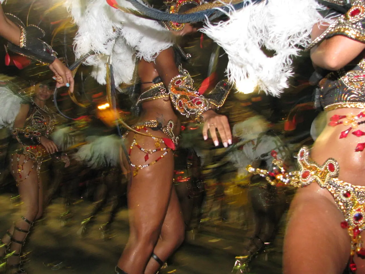 In this image there are people wearing costumes and dancing.