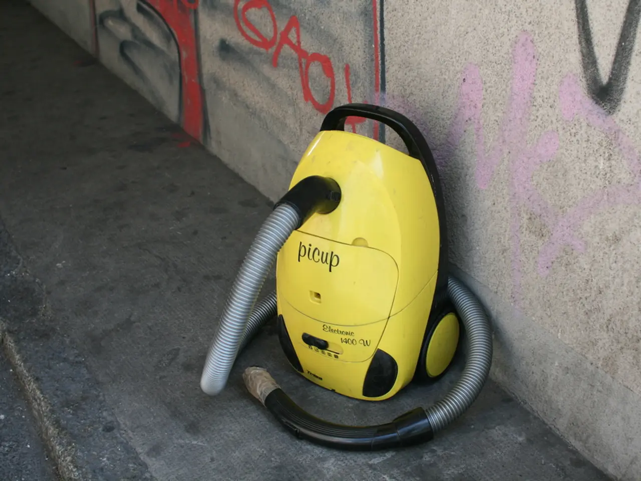 In the center of the image, we can see a machine on the floor and in the background, there is...