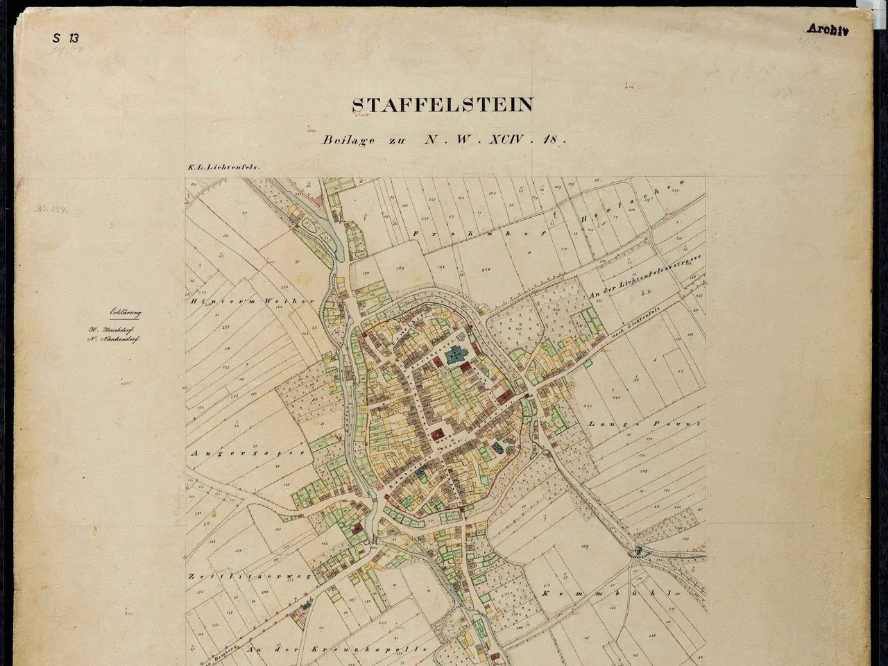 The image shows an old map of the city of Staffelstein, Germany, with a black background. The map...