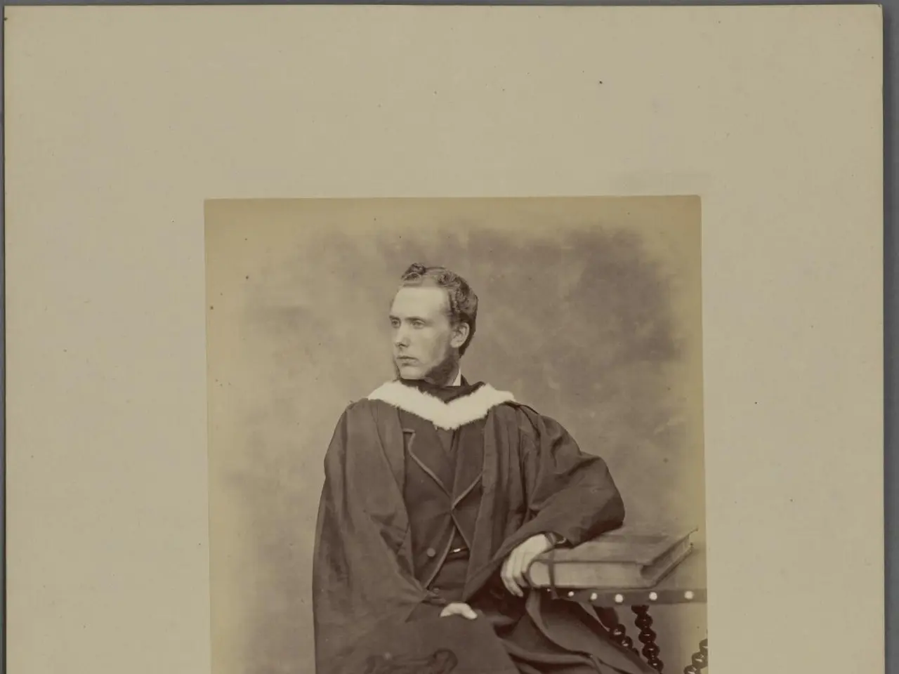 The image shows an old black and white photo of Thomas Powell, the second master in the independent...