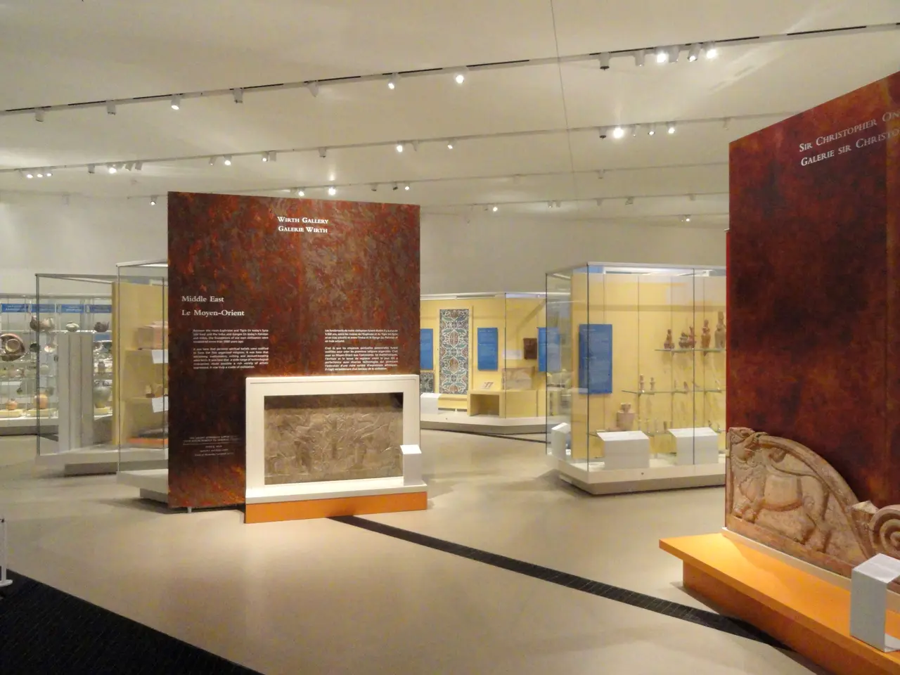 The image shows a large room filled with lots of different types of artifacts, including boards...
