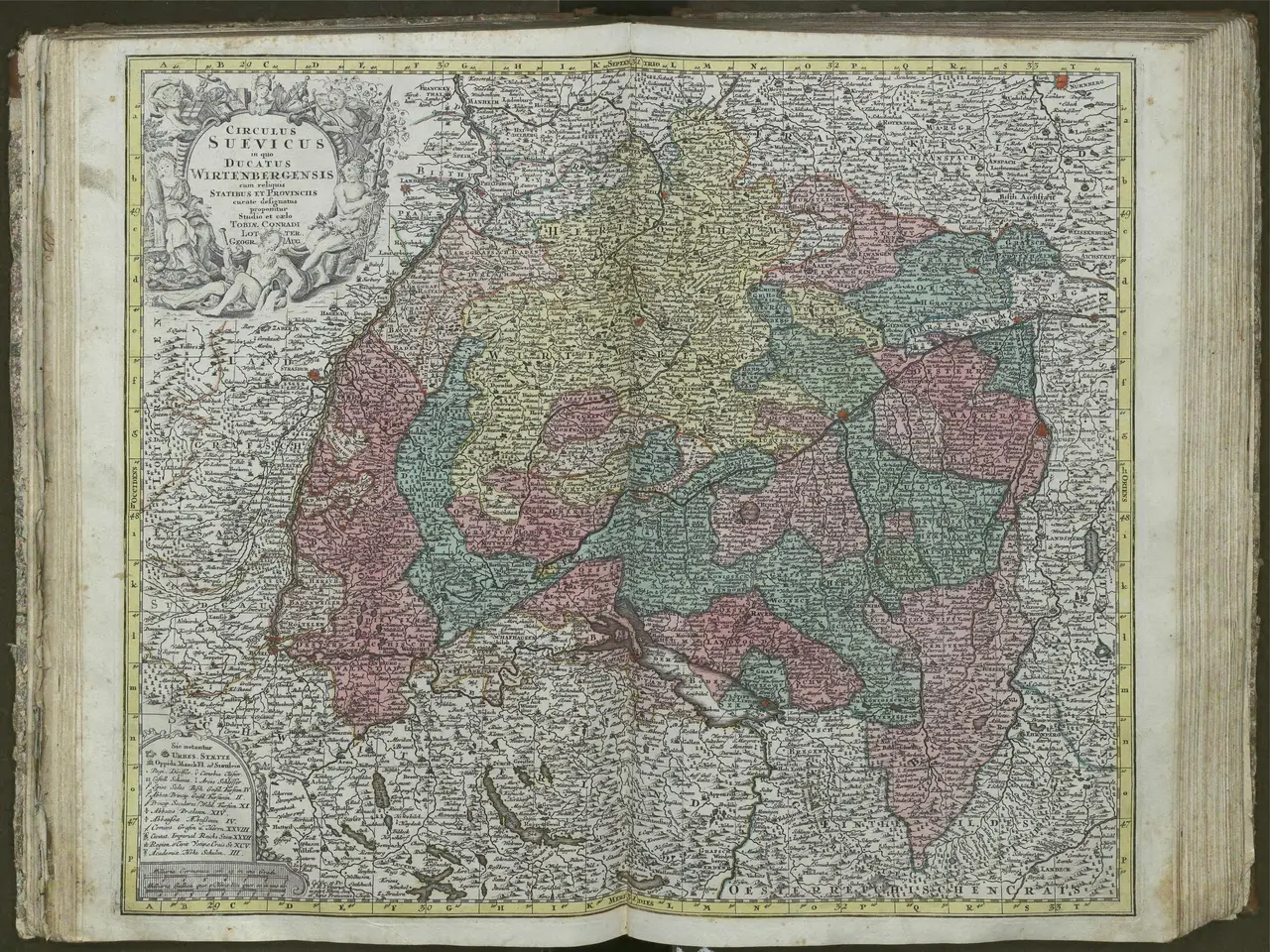 The image shows an open book with a map of Germany on it. The map is detailed and shows the various...