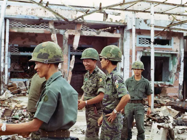In this image we can see demolished house and few soldiers standing.