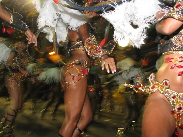 In this image there are people wearing costumes and dancing.