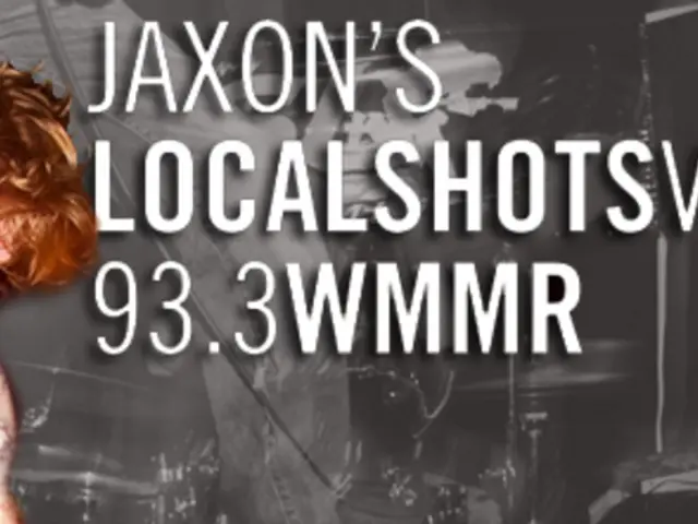 This looks like a poster. I can see a person standing and playing guitar. Here is another person...