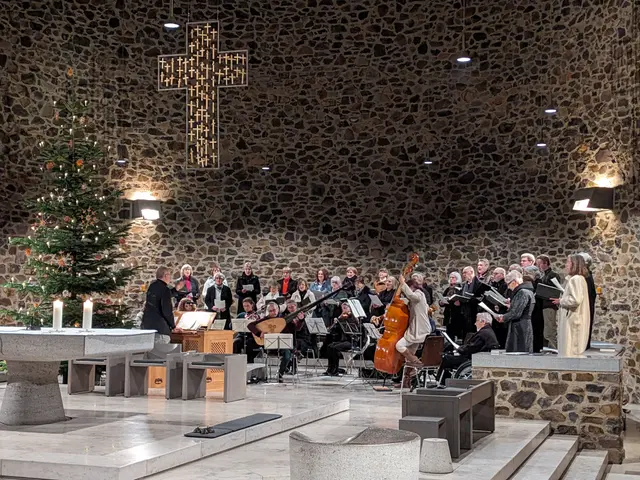 The image shows a group of people standing in front of a Christmas tree in a church. There are...