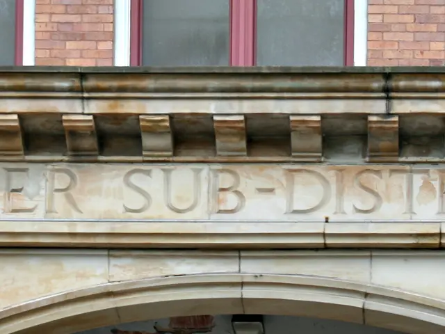 The image shows a brick building with a sign that reads "Beltzhoover Sub-District School" on the...