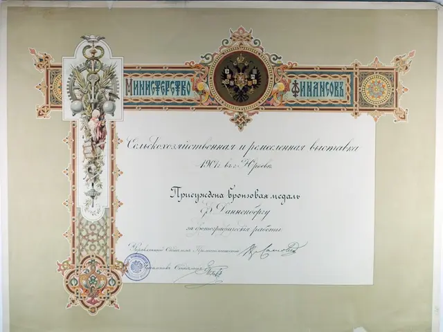 The image shows an old certificate with a coat of arms on it, framed and placed on a white surface....