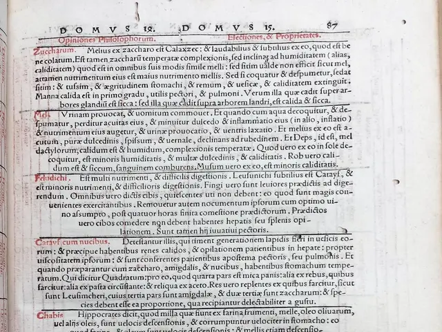 The image shows an open book with a drawing of food on it. The book is open to a page with text and...