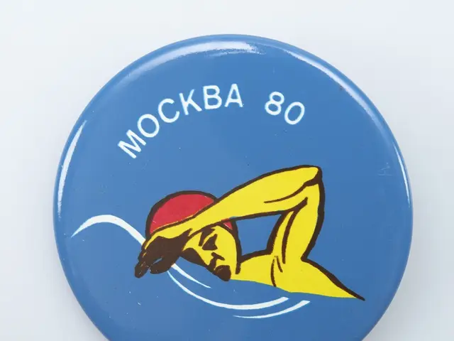 The image shows a blue badge with a picture of a man swimming in the water and the words "Mockba...
