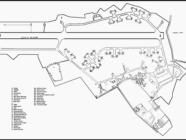 The image shows a black and white drawing of a map of a city with a lot of buildings, which is...