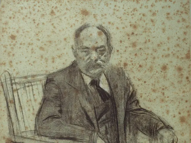 The image shows a man in a suit sitting in a chair, with a cigarette in his mouth. He has a serious...