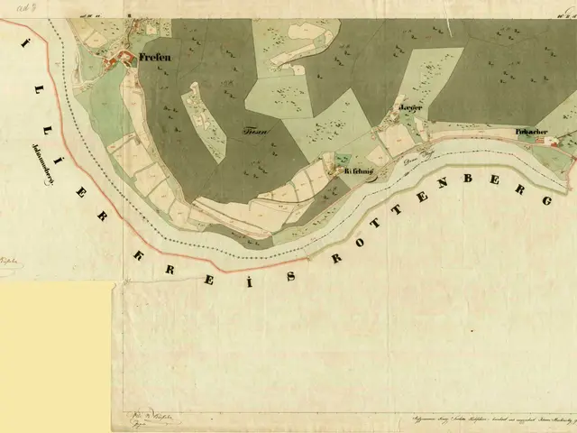 The image shows an old map of the city of Freien, Germany, with text written on it. The map is...