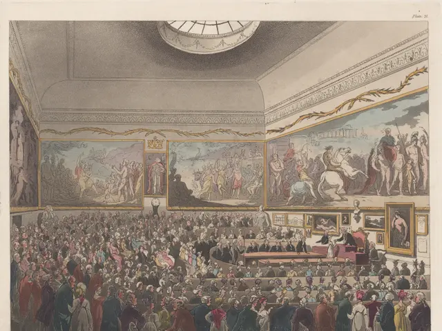 The image shows a large crowd of people in a room with paintings on the walls and a ceiling above...