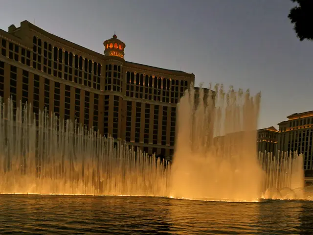 The image shows the Bellagio Fountains in Las Vegas, Nevada. The water is cascading down from the...