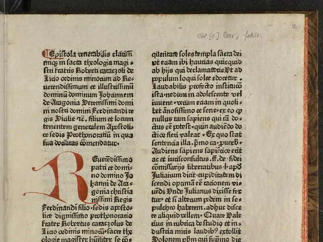 The image shows an open book with a red letter 'R' on it, which is a page from a bibl mazarine, ms...