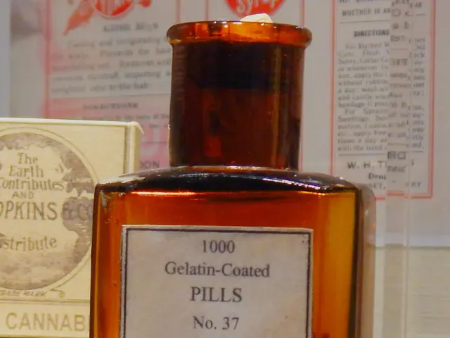 The image shows a bottle of cannabis indica extract sitting on top of a glass table, with a label...