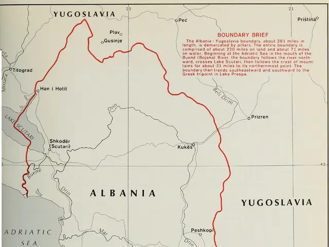 The image shows a poster with a map of Albania and Yugoslavia, with the borders of the two...