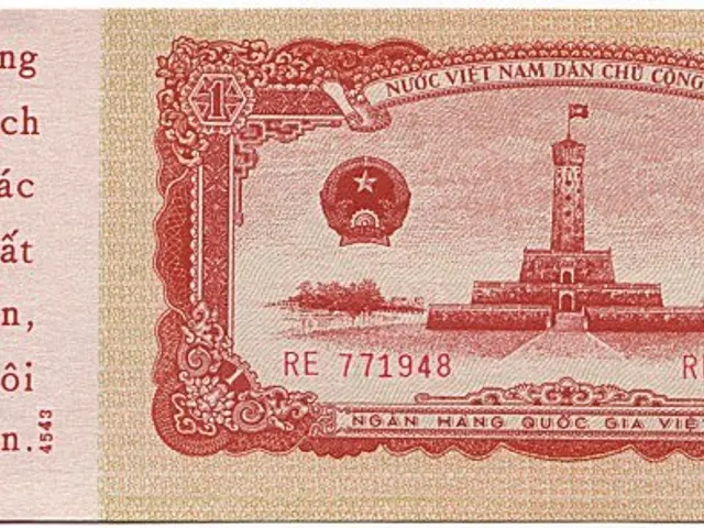 The image shows an old Vietnamese banknote with a picture of a tower on it. The text on the note...