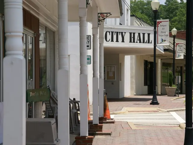 The image shows a city hall with buildings, street poles, street lights, name boards, motor...