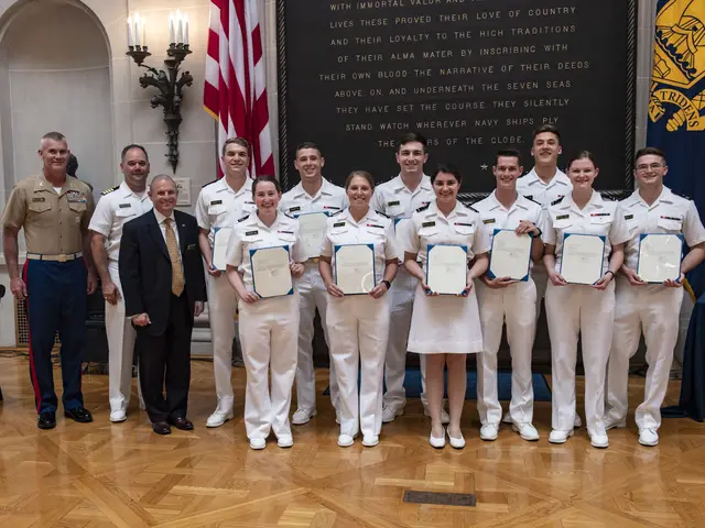 The image shows a group of people in uniform standing next to each other, smiling and holding...