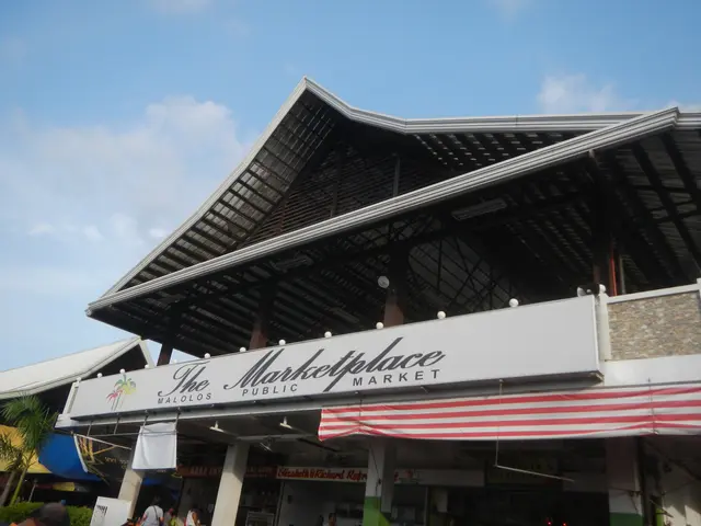 The image shows the marketplace public market in Koh Samui, Thailand. It is a building with a name...