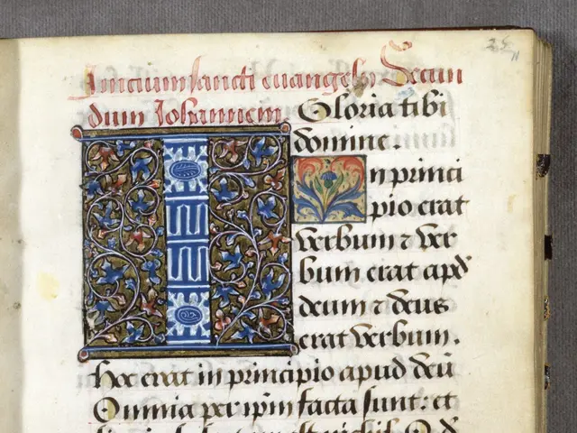 The image shows an open book with an illuminated manuscript featuring a blue and gold design. The...