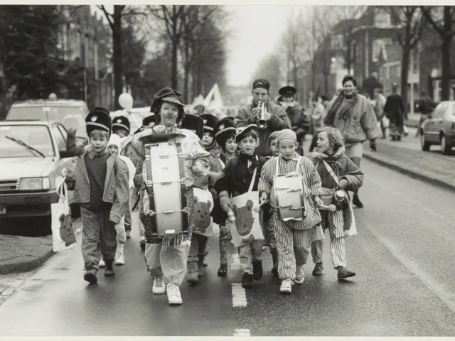 The image shows a group of children walking down a street, each holding a musical instrument in...