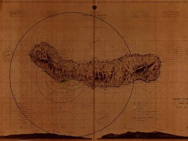 The image shows an old map of the island of Hawaii with a circle in the middle of it. The map is on...