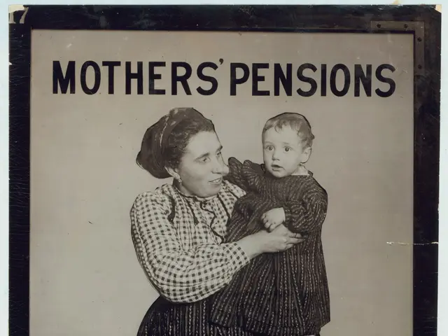 The image shows a woman holding a baby in her arms, with a poster behind her that reads "Mother's...