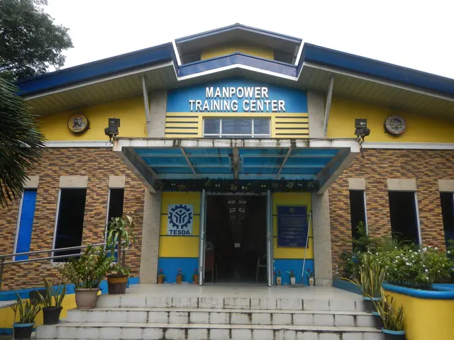 The image shows the Manpower Training Center in Manila, Philippines. It is a building with windows,...