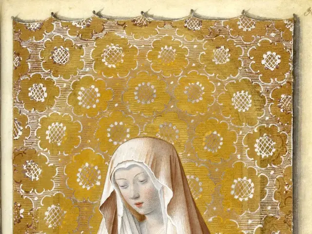 The image shows an illuminated manuscript depicting the Virgin Mary, with her hands clasped in...